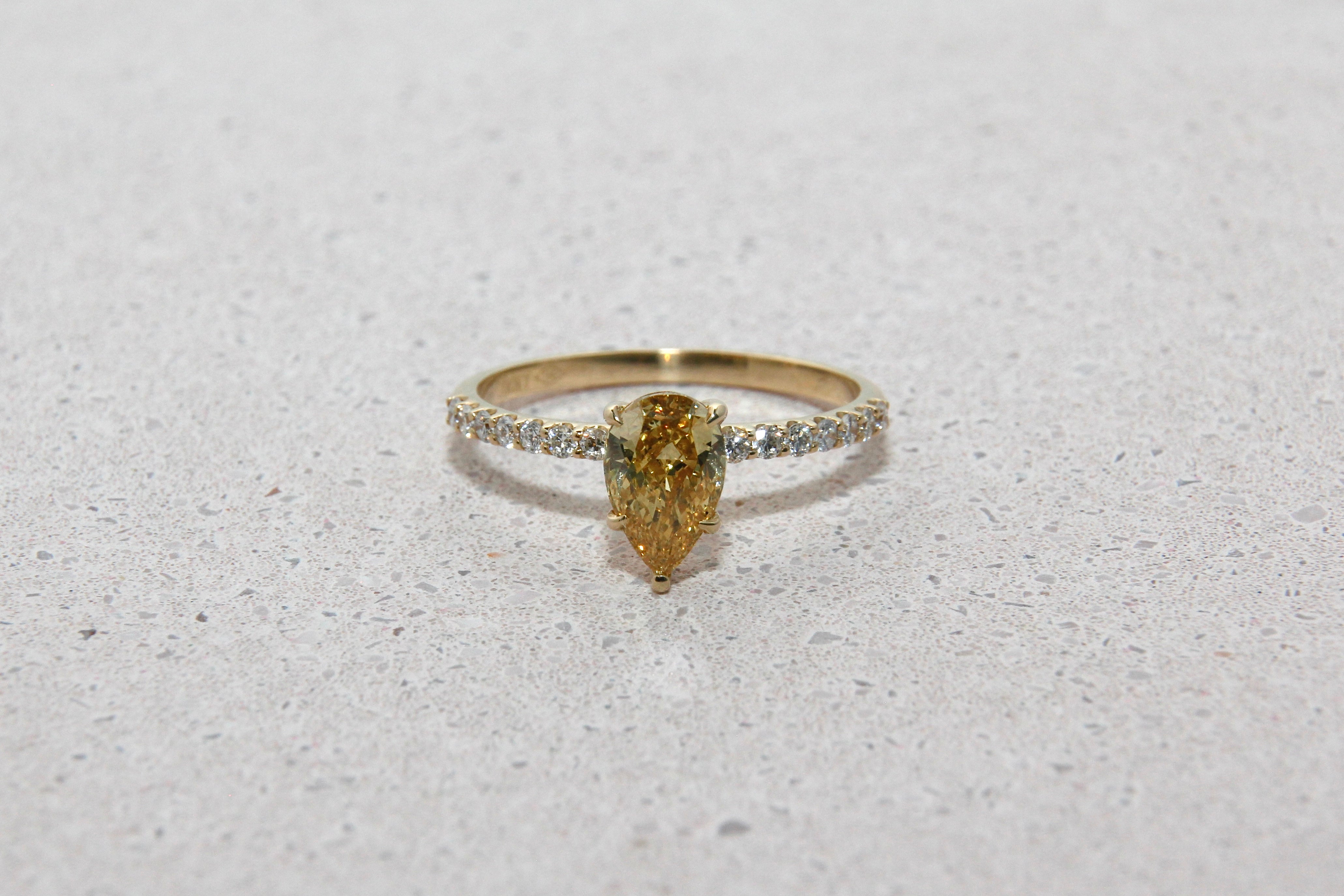 Pear Shape Yellow Fancy Vivid Diamond Ring with Half Eternity
